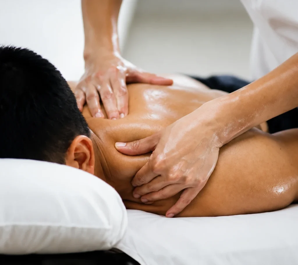Deep tissue massage for scoliosis upper back relief at Greenlight Chiropractic & Wellness Lab