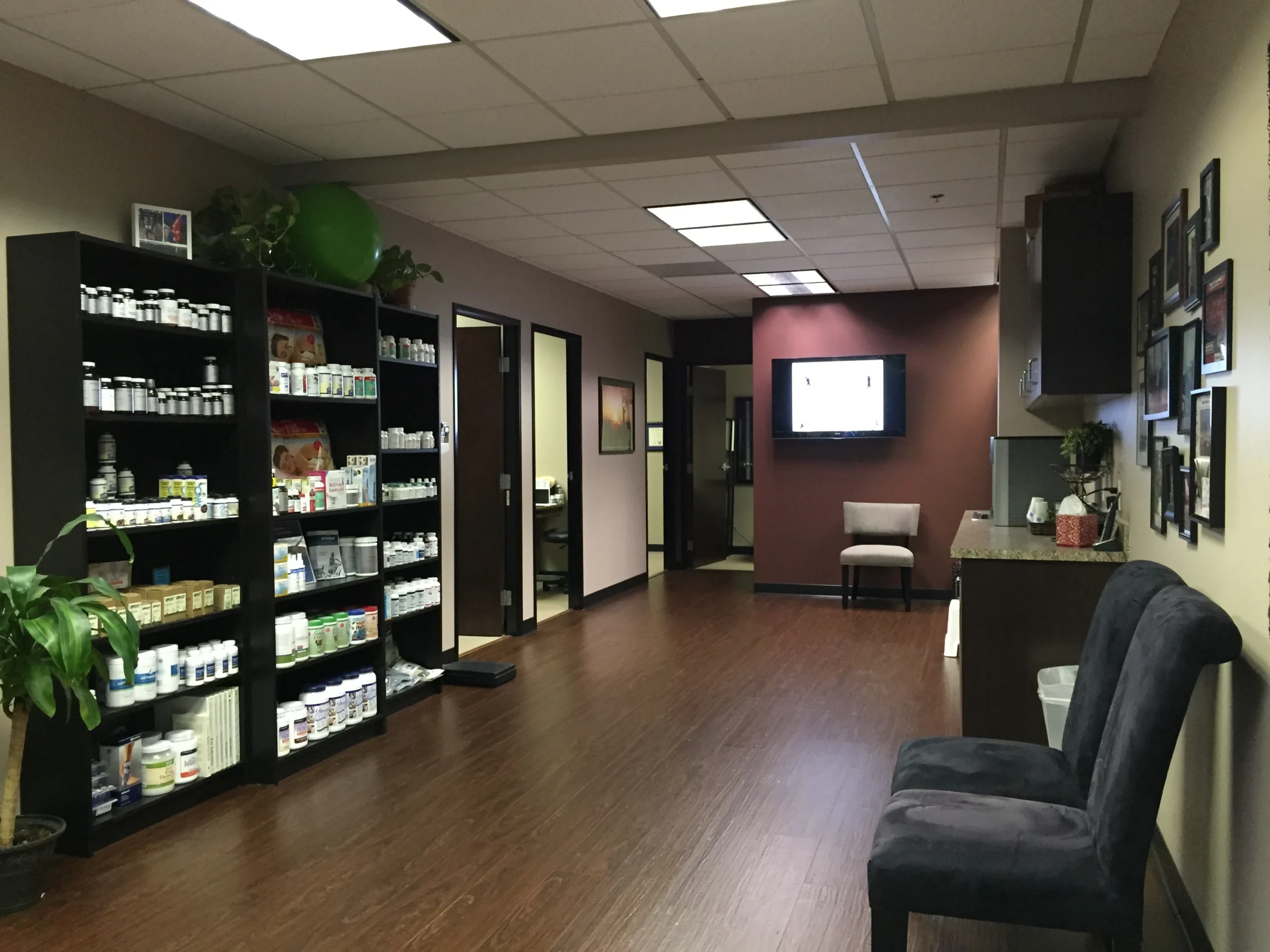 greenlight chiropractic lake forest office hallway supplement display scaled
